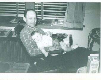 1940s Tired Dad Holding Baby Rocking Chair Milk Carton Telephone Table 40s Vintage Photograph Black White Photo