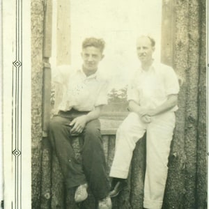 1930s Father Son Sitting in Log Cabin Window Home Building 30s Vintage Photograph Black White Photo
