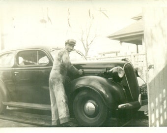 The Mechanic Man in Coveralls Opening Car Hood Vintage Black White Photo Photograph