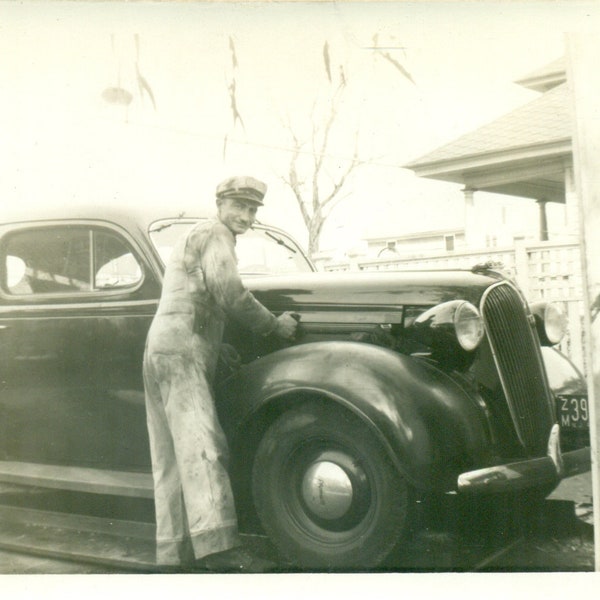 The Mechanic Man in Coveralls Opening Car Hood Vintage Black White Photo Photograph