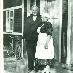 1930s Grandparents Elderly Couple Woman in Apron Bike Outside Porch 30s Vintage Photograph Black White Photo