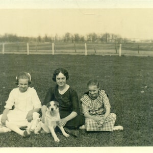 Happy Dog Sitting in Grass With Girls Mother 1920s RPPC Real Photo Postcard Vintage Photograph