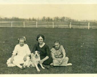 Happy Dog Sitting in Grass With Girls Mother 1920s RPPC Real Photo Postcard Vintage Photograph