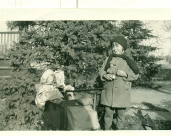 1930s Girl With Dolls in Cart Outside Winter Coat Toys Photo Black White Photograph