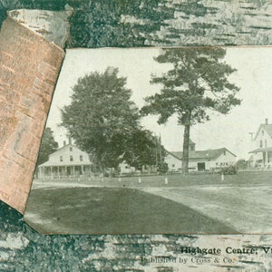 May include: Vintage postcard featuring a black and white image of Highgate Centre, Vt. The image shows a rural scene with houses, trees, and a road. The postcard is framed by a piece of birch bark. Text at the bottom reads "Published by Cross & Co."