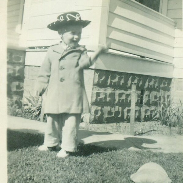 Little Boy in Toy Western Cowboy Hat Playing Outside 1940s Black White Vintage Photo Photograph