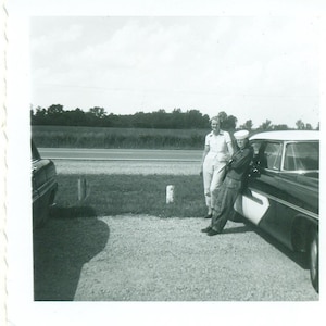 1950s Woman Wearing White Sailor Hat Leaning on Car 50s Vintage Photograph Black White Photo