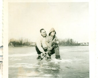 1950s Learning To Ice Skate Man Holding Skates Boy Frozen Lake Vintage Black White Photo Photograph