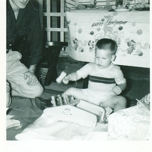 Toddler Birthday Baby Boy Playing With Hammer and Peg Toy Banner Behind Vintage 1940s Black and White Photo Photograph