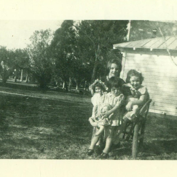 Little Girls Hugging Their Dolls Standing Outside 1930s 40s Vintage Black White Photo Photograph
