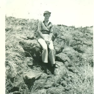 Sweetwater Texas Woman Sitting on Rocks Outside Wearing Pants 1940s 40s Vintage Black and White Photo Photograph