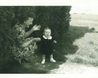 1950 Baby Almost Walking Standing Holding Grandma Hand Photo Vintage Black White Photograph Picture