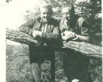 Vintage 1950s Photo Old Married Couple Standing Outside Leaning on a Tree Branch Forest Woods Outside Man Woman Wife Husband