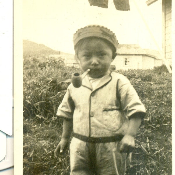 Unalaska Dutch Harbor Alaska Native Boy With Pipe Basket Woven Hat Vintage RPPC Real Photo Postcard unmailed