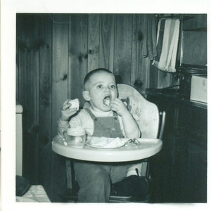 1960 Toddler Boy Eating Bread in High Chair Sippy Cup 60s Vintage Photograph Black White Photo
