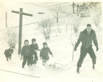 1940s Dad Pulling Sled Up Hill Snow 4 Little Boys Happily Following Behind Winter Vintage Black White Photo Photograph