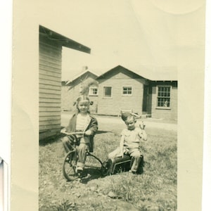 1920s Girl On Tricycle Boy Sitting on Train Peddle Car Toys Yard Black White Photo Photograph