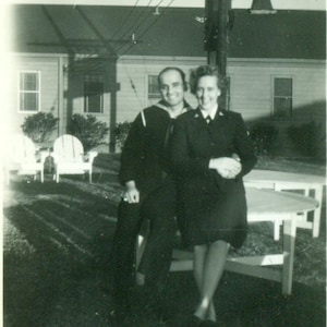 Navy Sailor and Woman in Uniform Military Couple Sitting on Base 1940s WW2 Vintage Photo Black and White Photograph