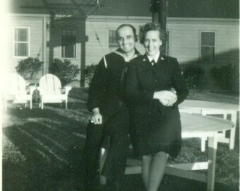 Navy Sailor and Woman in Uniform Military Couple Sitting on Base 1940s WW2 Vintage Photo Black and White Photograph