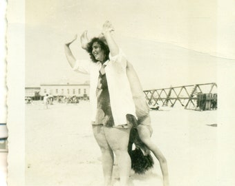 Hands And Feet Up Man Leaning on Woman For Handstand At Beach 1950s Vintage Black White Photo Photograph