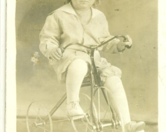 Grumpy Little Boy Riding Tricycle Studio Portrait RPPC Real Photo Postcard Antique