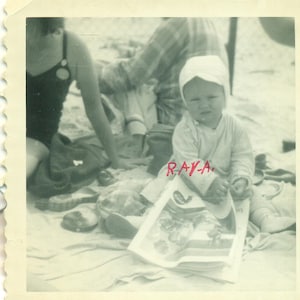 Baby Playing with Magazine on the Beach Blanket 1950s Photo Black White Photograph