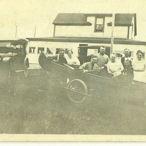Ready for Adventure Family Posing in Canoe Boat on Car Trailer Antique Black and White Vintage Photo Photograph