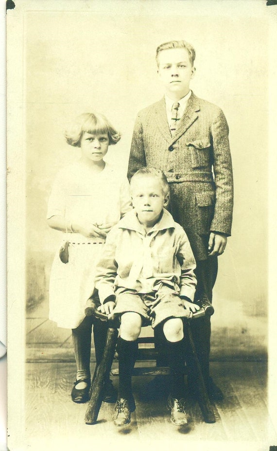 RPPC photo postcard of two African-American siblings c. 1930s RPPC photo postcard of two African-American siblings c. 1930s