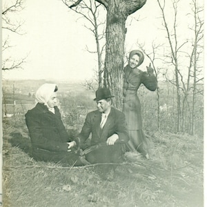 Cross Dressing Humor 1910 Man in Suit and Head Scarf Holding Hands With Other Man Lady Behind RPPC Real Photo Postcard Photograph