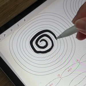 May include: A digital drawing of a black spiral on a tablet screen. A hand holds a stylus, adding to the spiral design. The screen also shows instructions with the words "press" and "lift".