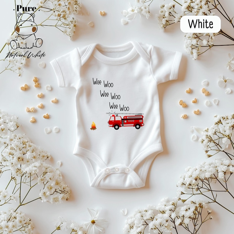 a white bodysuit with a red truck on it