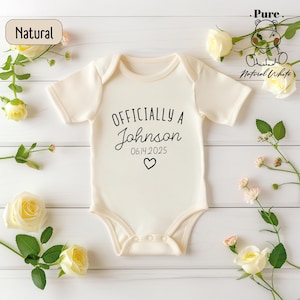 a baby bodysuit with the words officially a johnson on it
