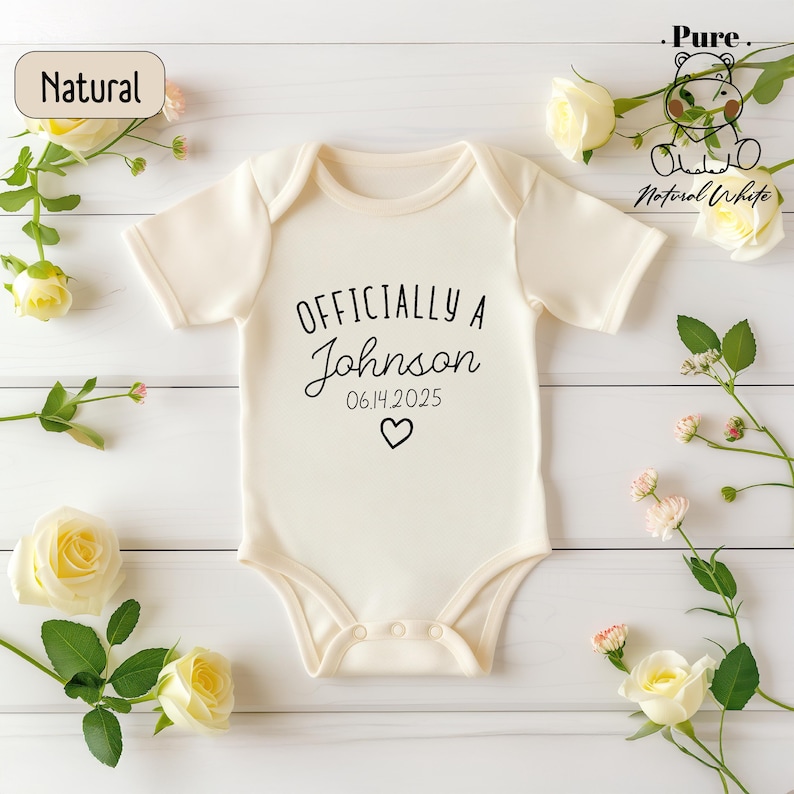a baby bodysuit with the words officially a johnson on it