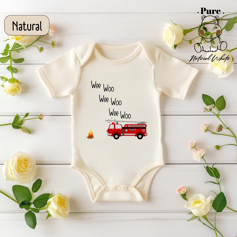 a white bodysuit with a red truck on it