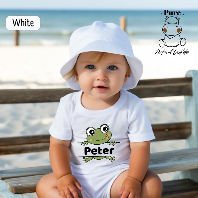 a baby sitting on a bench wearing a white hat