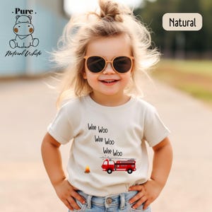 a little girl wearing a t - shirt that says, we were who we were