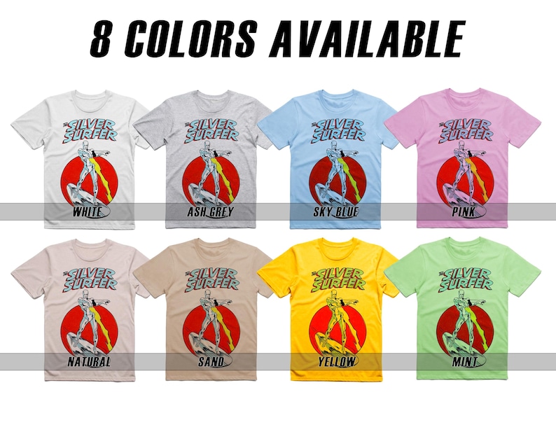 May include: Eight t-shirts featuring the Silver Surfer, a Marvel Comics character, in different colors: white, ash grey, sky blue, pink, natural, sand, yellow, and mint. Each shirt has the words "Silver Surfer" printed on the front.