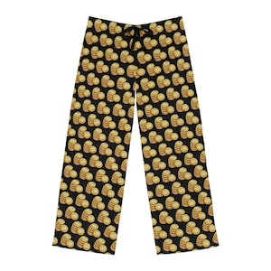 May include: Black pajama pants with a repeating pattern of gold Bitcoin coins. The pants have a drawstring waist and a relaxed fit. The Bitcoin coins are stacked in piles and have the Bitcoin symbol.