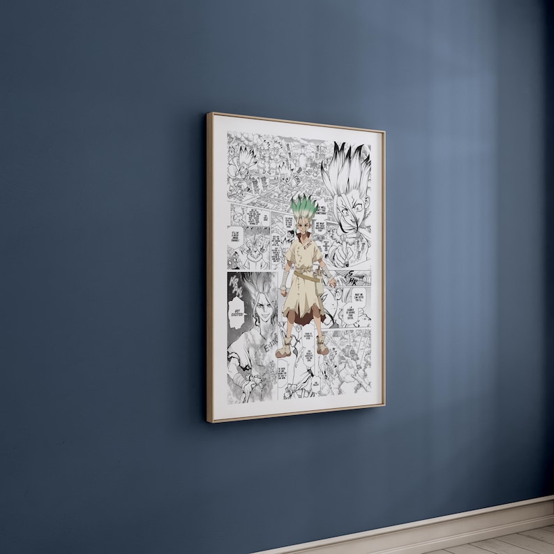 May include: A framed manga art print featuring a character with green hair and a tan outfit. The artwork is in black and white with Japanese text and is set against a blue wall. The frame is gold.