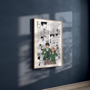 Op de afbeelding: Een ingelijste manga-kunstprint met een zwart-wit stripverhaal. In het midden staat een stel met groene jassen en bruine broeken. De lijst is goudkleurig.