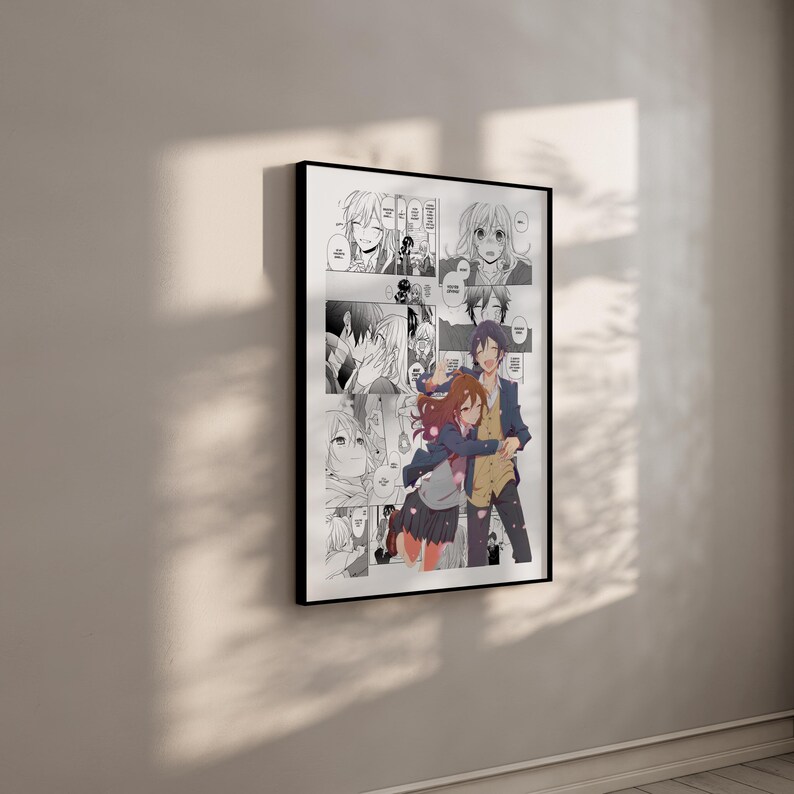 Peut inclure: Impression d'art manga encadr&eacute;e, pr&eacute;sentant des panneaux d'illustrations en noir et blanc et une image en couleur d'un couple s'embrassant. L'&oelig;uvre est affich&eacute;e sur un mur blanc, avec une ombre port&eacute;e.