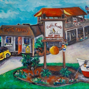 May include: A painting of a seaside restaurant called "Capt'n Franks Hot Dogs". The restaurant has a red roof and a yellow sign with a bird on it. There is a yellow Volkswagen Beetle parked in front of the restaurant. There is a small boat tied to a post in the foreground.