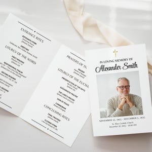 May include: A memorial service program with the text "In Loving Memory of Alexander Smith" and a photo of a man. The program includes the order of service, with sections for Entrance Rites, Liturgy of the Word, and Prayers.