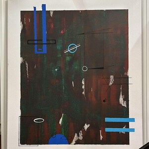 May include: Abstract painting with geometric shapes in blue, black, and white on a brown and green background.