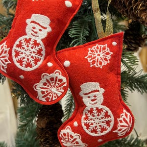 A pair of Christmas stocking ornaments