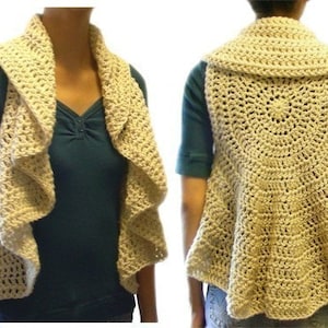 May include: A crocheted vest with a ruffled neckline and a circular pattern on the back. The vest is made in a cream color.
