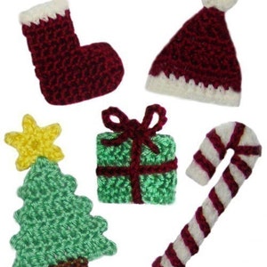 May include: A set of five crocheted Christmas ornaments: a stocking, a Santa hat, a Christmas tree, a gift box, and a candy cane. The ornaments are all red, white, and green.