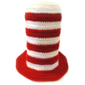 May include: A red and white striped crocheted hat with a wide brim.