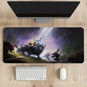 May include: A rectangular mouse pad featuring a fantasy scene with a warrior riding a lion-like creature. The artwork includes a keyboard, mouse, and computer monitor. The color palette includes purple, black, and white.