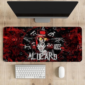 May include: A black and red gaming mouse mat featuring a graphic of a vampire character with a red hat and yellow eyes. The character is surrounded by a circle of eyes and the text "Alucard" is written in a gothic font.